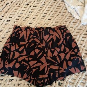 a. new. day. Paper bag shorts